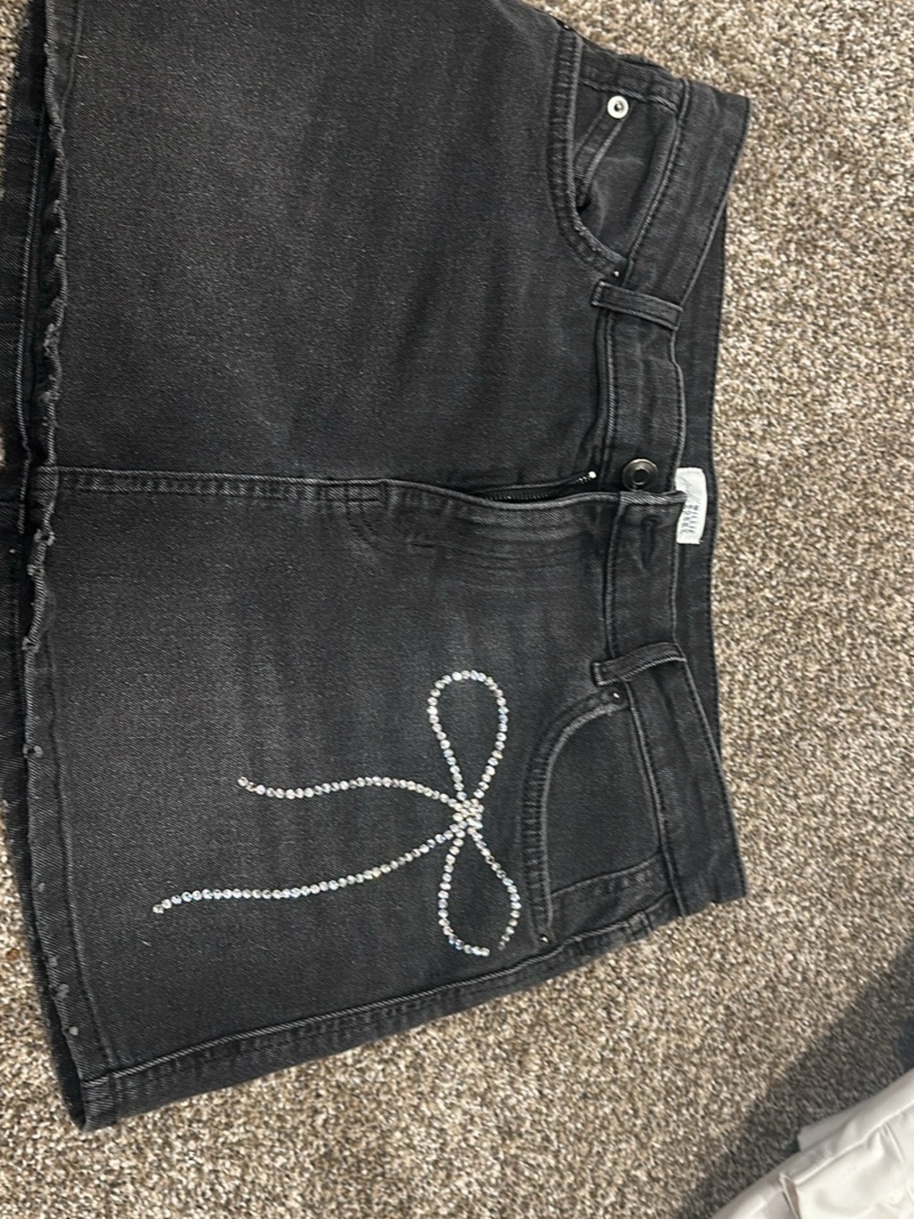 Black Women's Denim Mini Skirt with Crystal Bow Detail - Picture 1 of 4